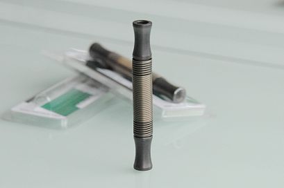Impact core for screw nozzles with FEDDY spring